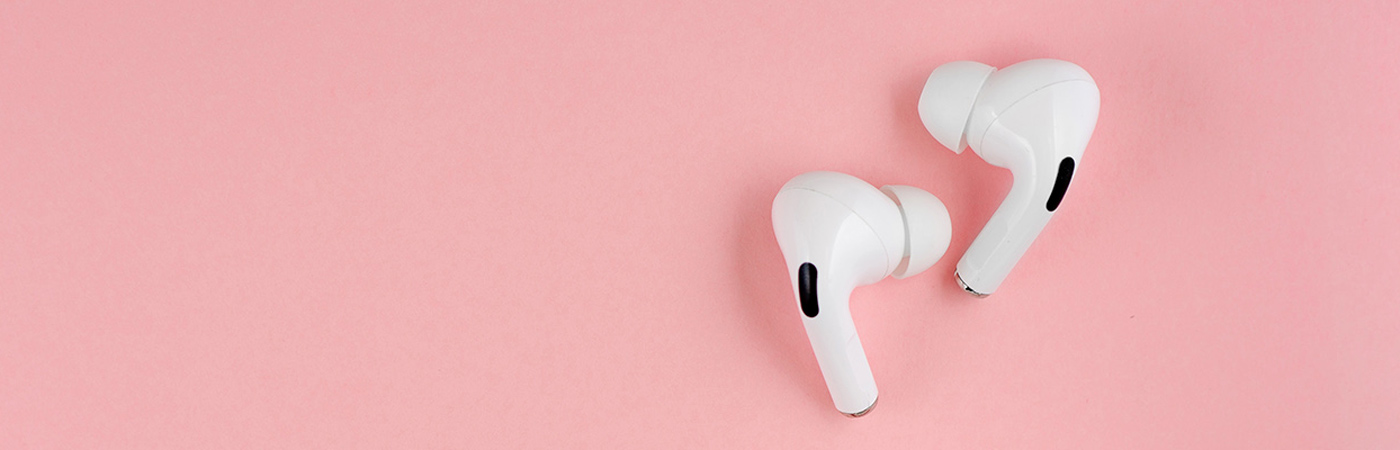 Airpods on flamingo pink background